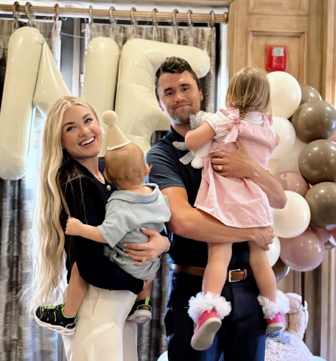 Charlie Kirk memorial photo with Erika and children